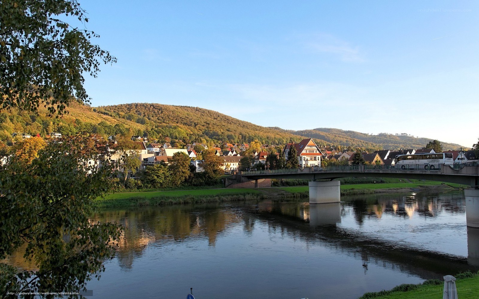 River town with bridge and hills