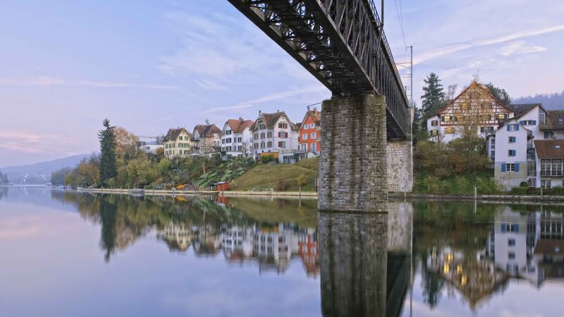 River town with bridge reflection