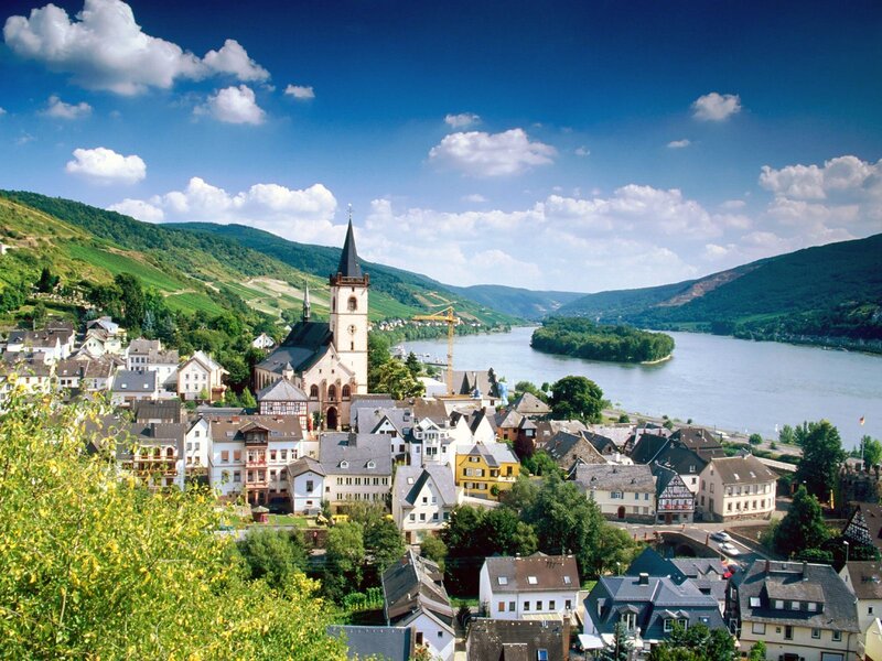 River town with church and hills