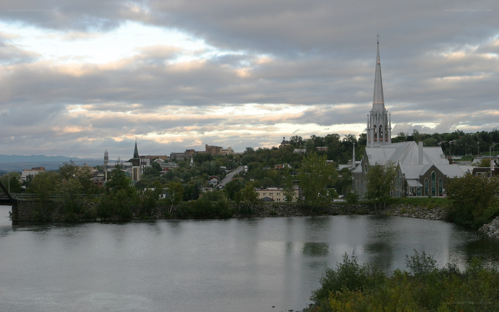 River town with church spire