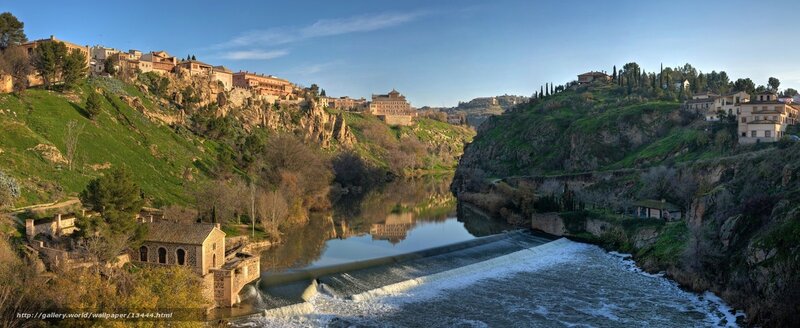 River town with dam and cliffs