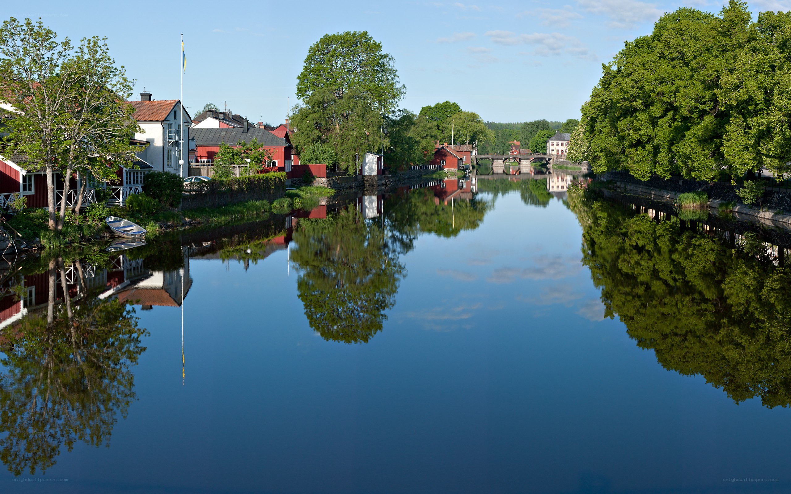 River town with red buildings