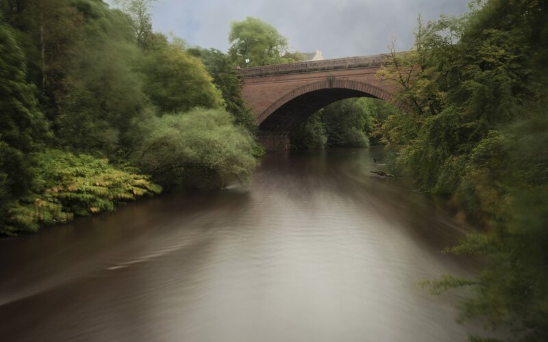 River under stone bridge