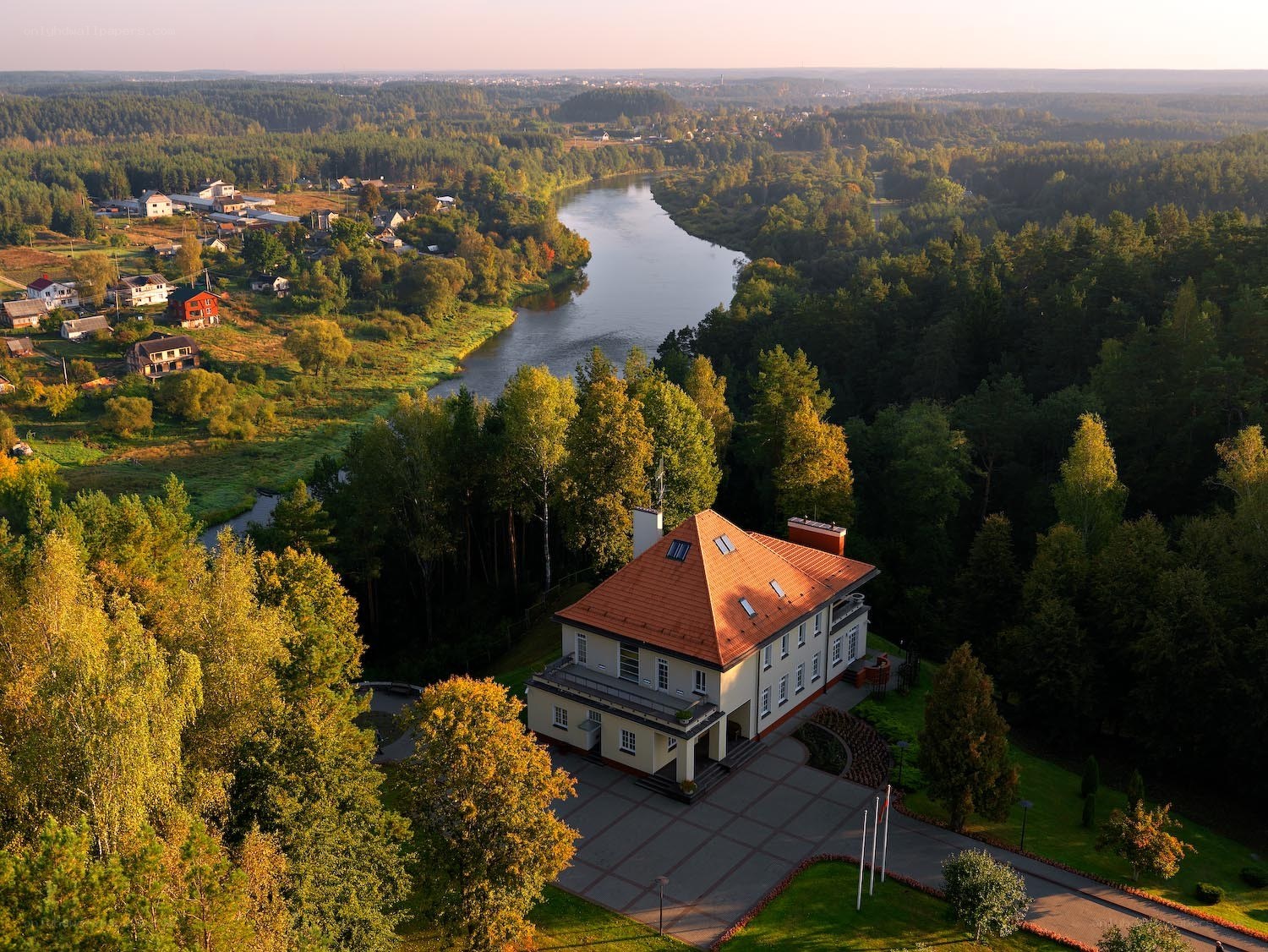 River valley estate at sunset