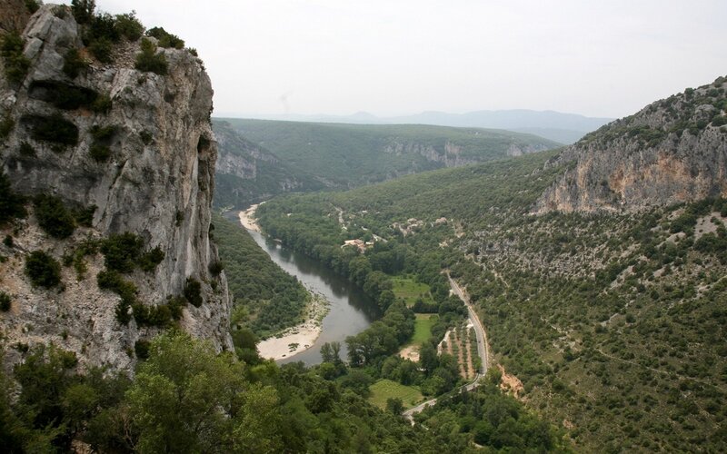River Valley Landscape — Green, Serene, Afternoon, Photograph, Cliffs