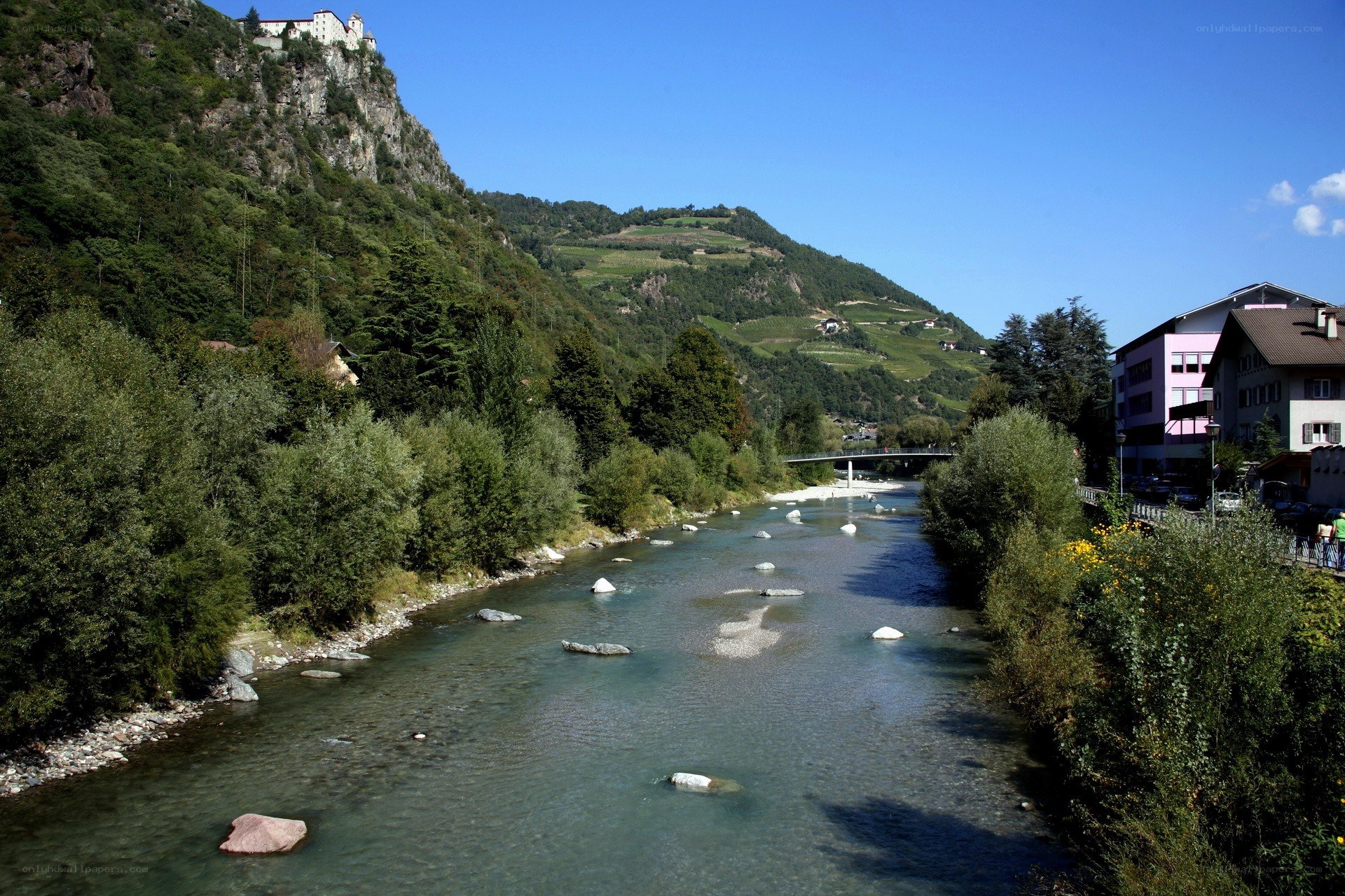 River valley with castle and town