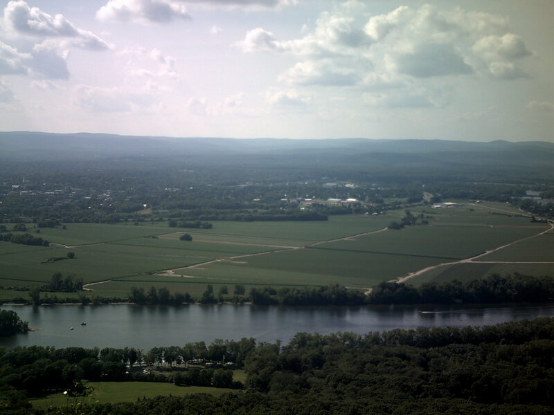 river valley with fields and town