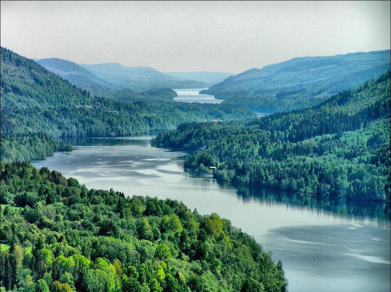 river valley with forested hills