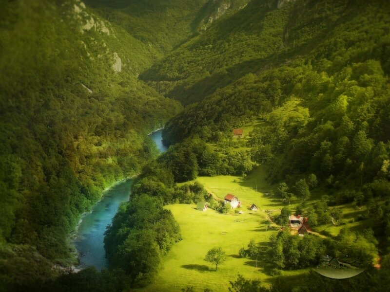 River valley with green hills