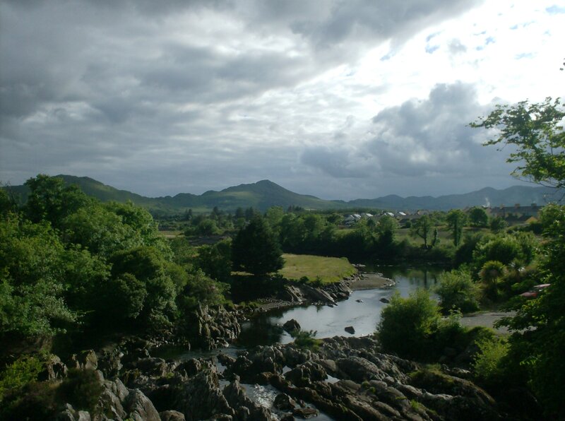 River valley with hills and village