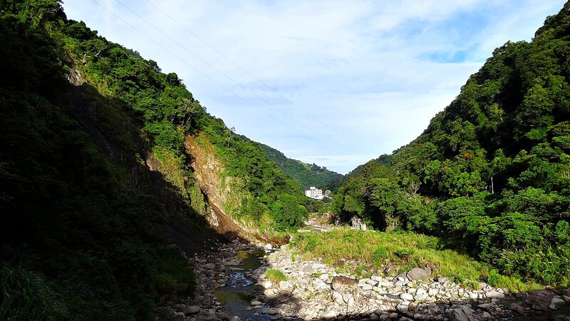 River valley with lush green hills