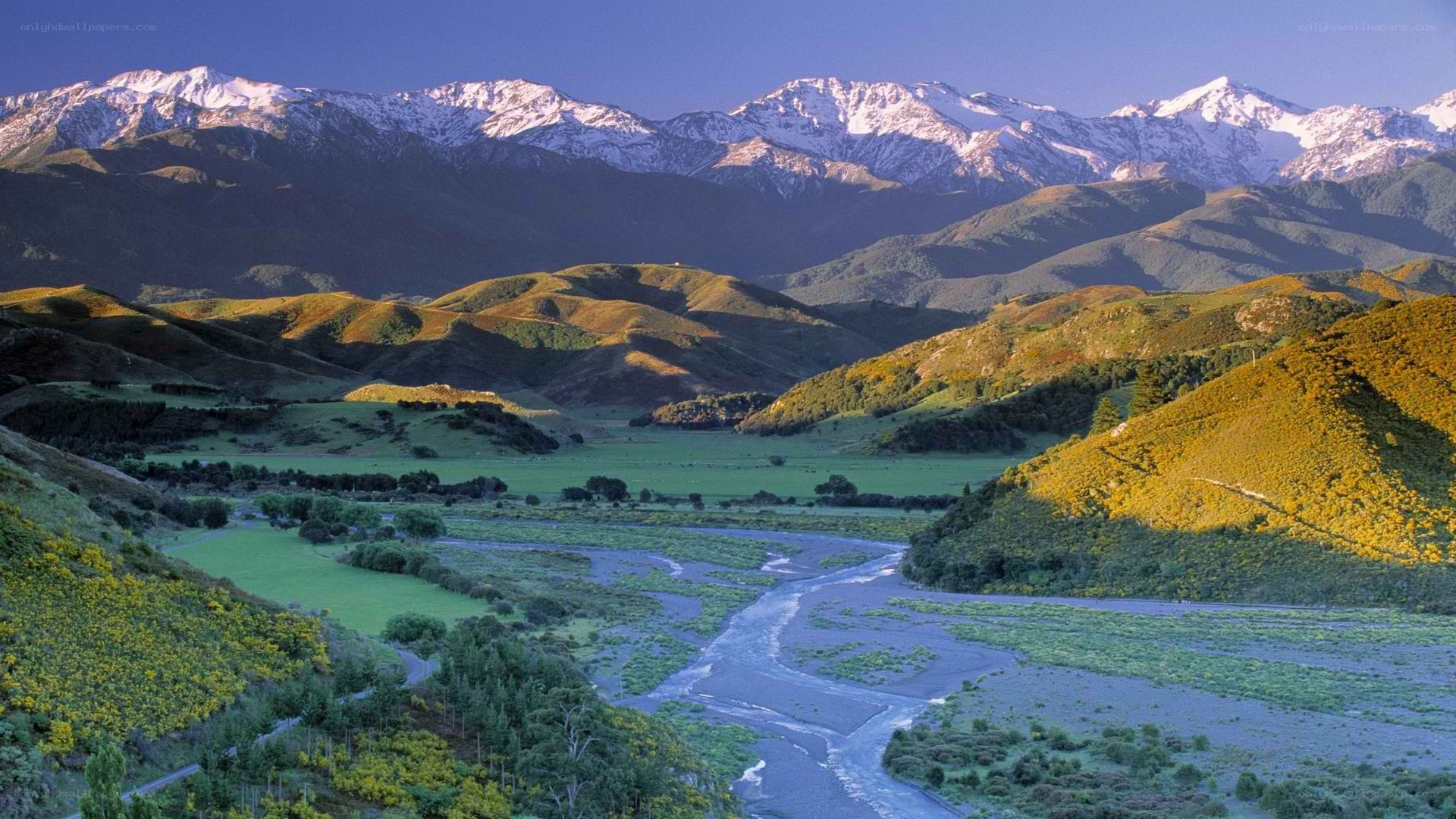 River valley with snow-capped mountains