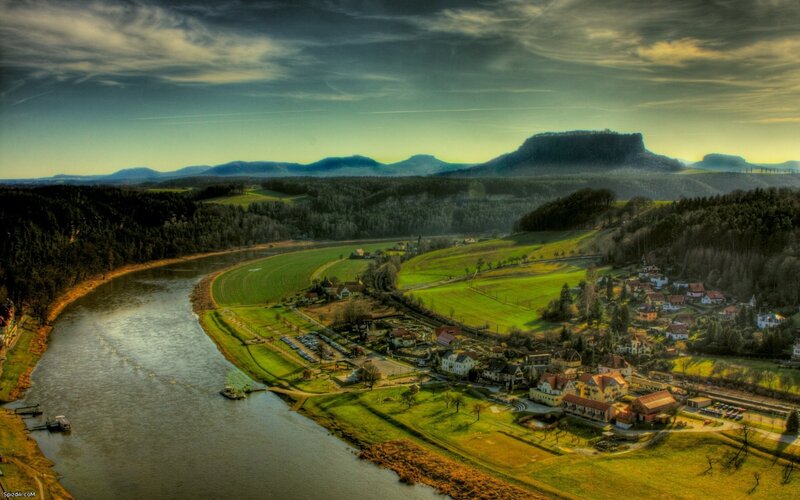 River valley with village and mountains