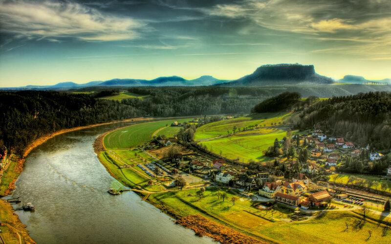 River valley with village and mountains