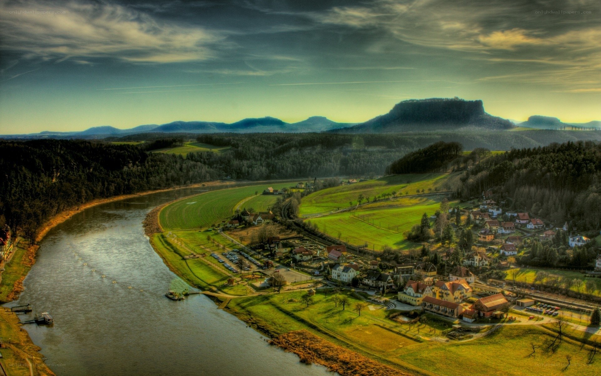 River valley with village and mountains