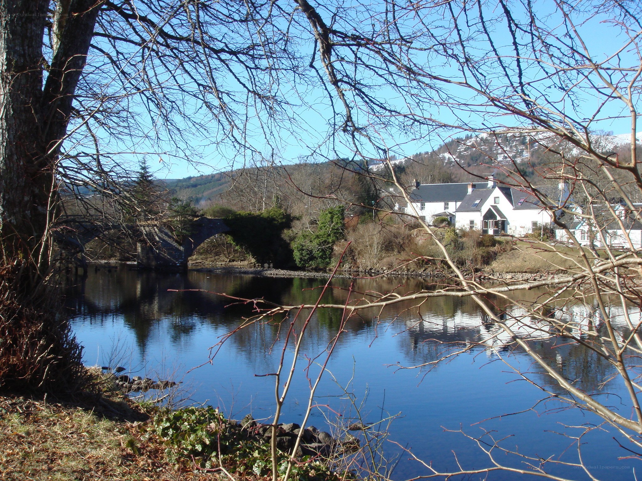 River view with bridge and house