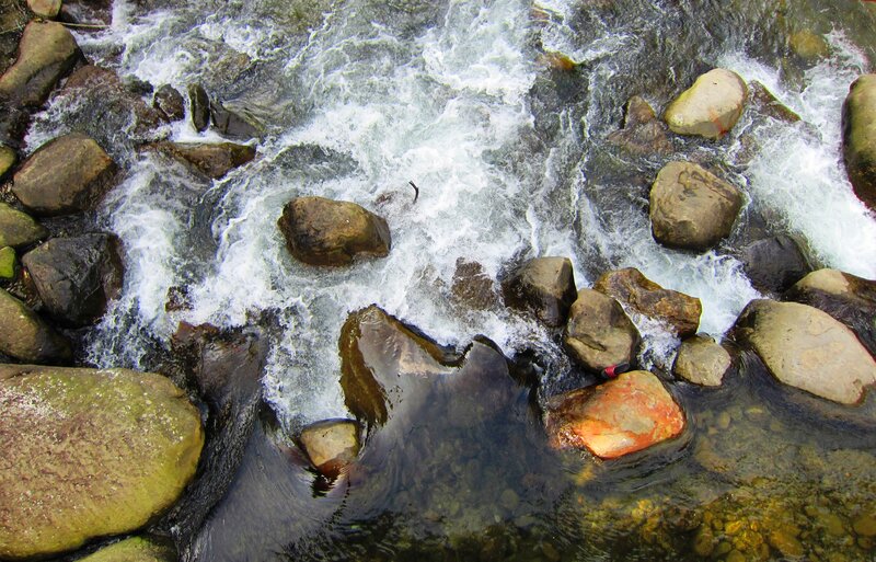 River Water over Rocks — Brown