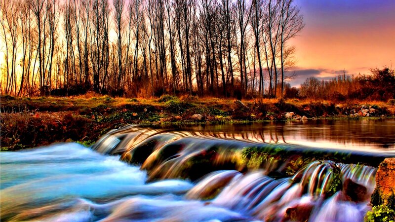 River waterfall at sunset