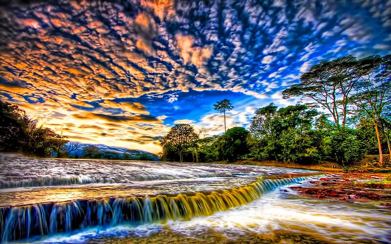 River Waterfall at Sunset — Blue, Dramatic, Photograph, Trees
