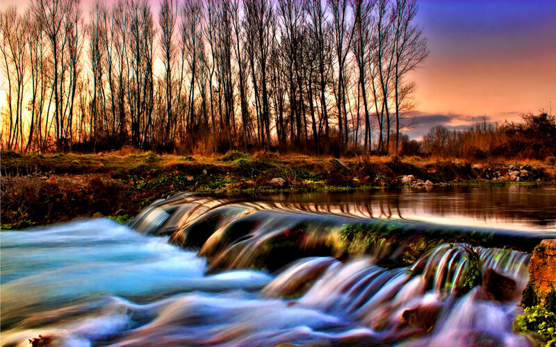 River Waterfall at Sunset — Blue