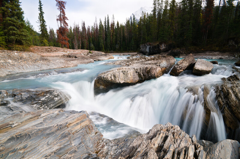 River Waterfall in Forest — Blue, Serene, Autumn, Photograph