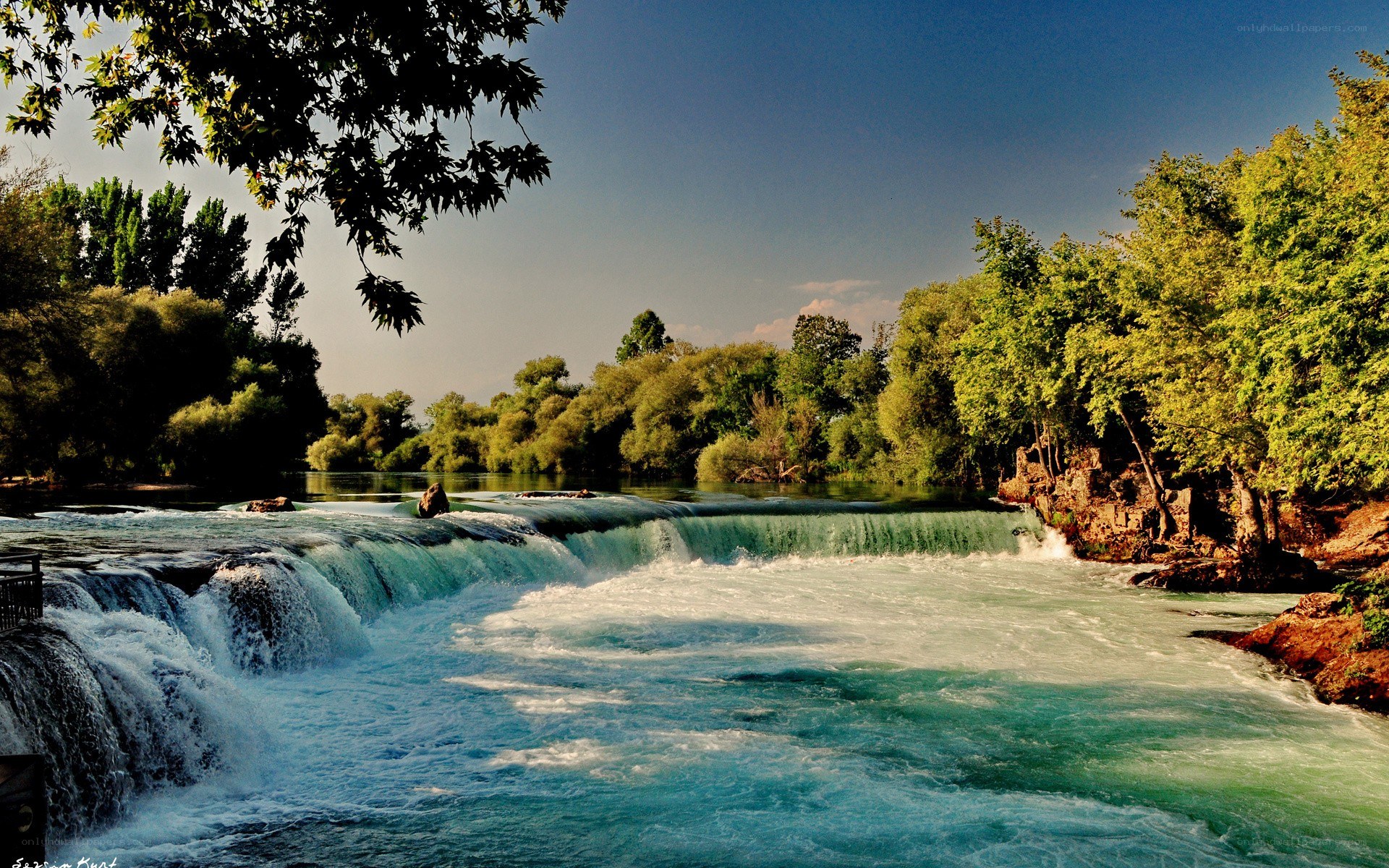 River waterfall in lush greenery