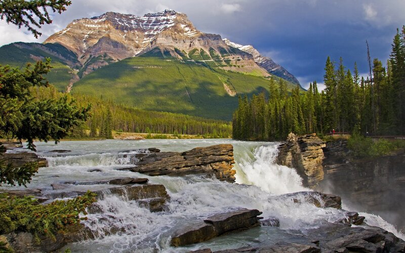 River Waterfall in Mountains — Green, Dramatic, Afternoon, Photograph, Mountain