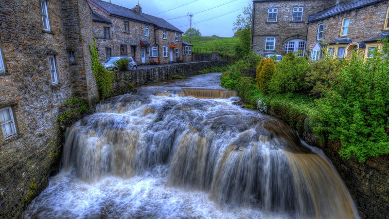 River Waterfall in Village — Brown
