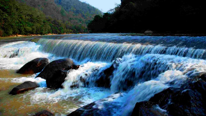 River Waterfall over Rocks — Blue