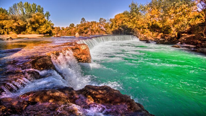 River Waterfall with Green Water