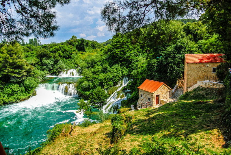 River Waterfalls and Stone Houses