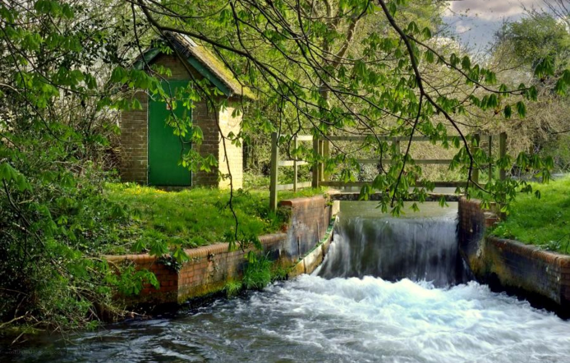 River weir with small building