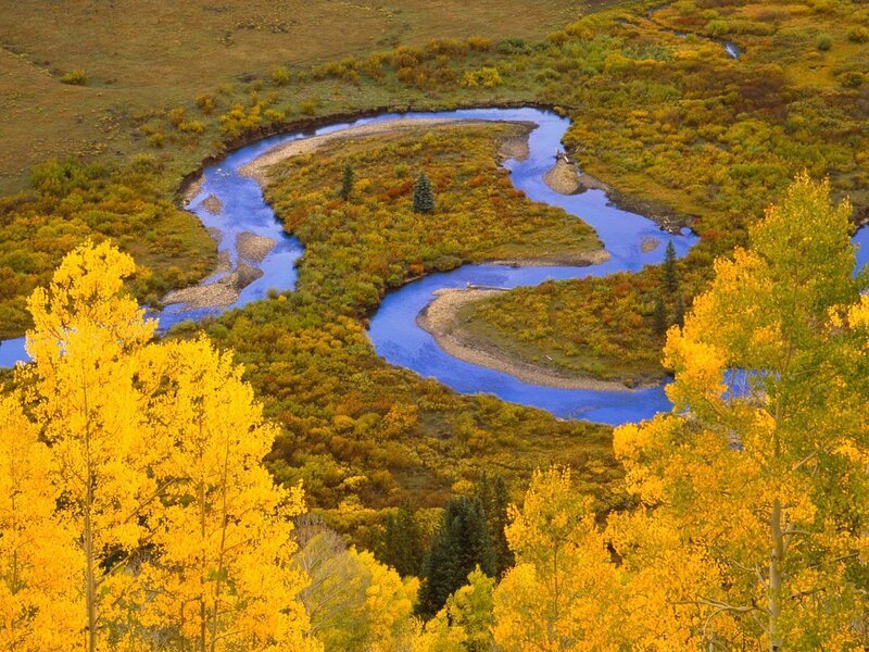 River winding through autumn forest
