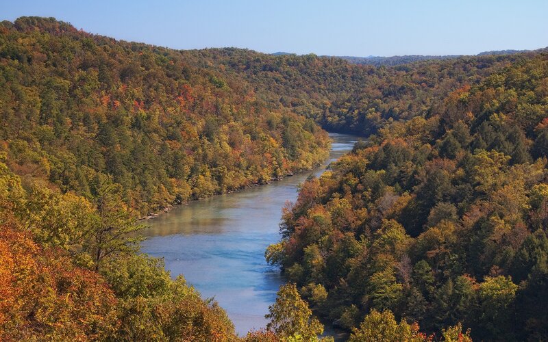 River winding through autumn forest