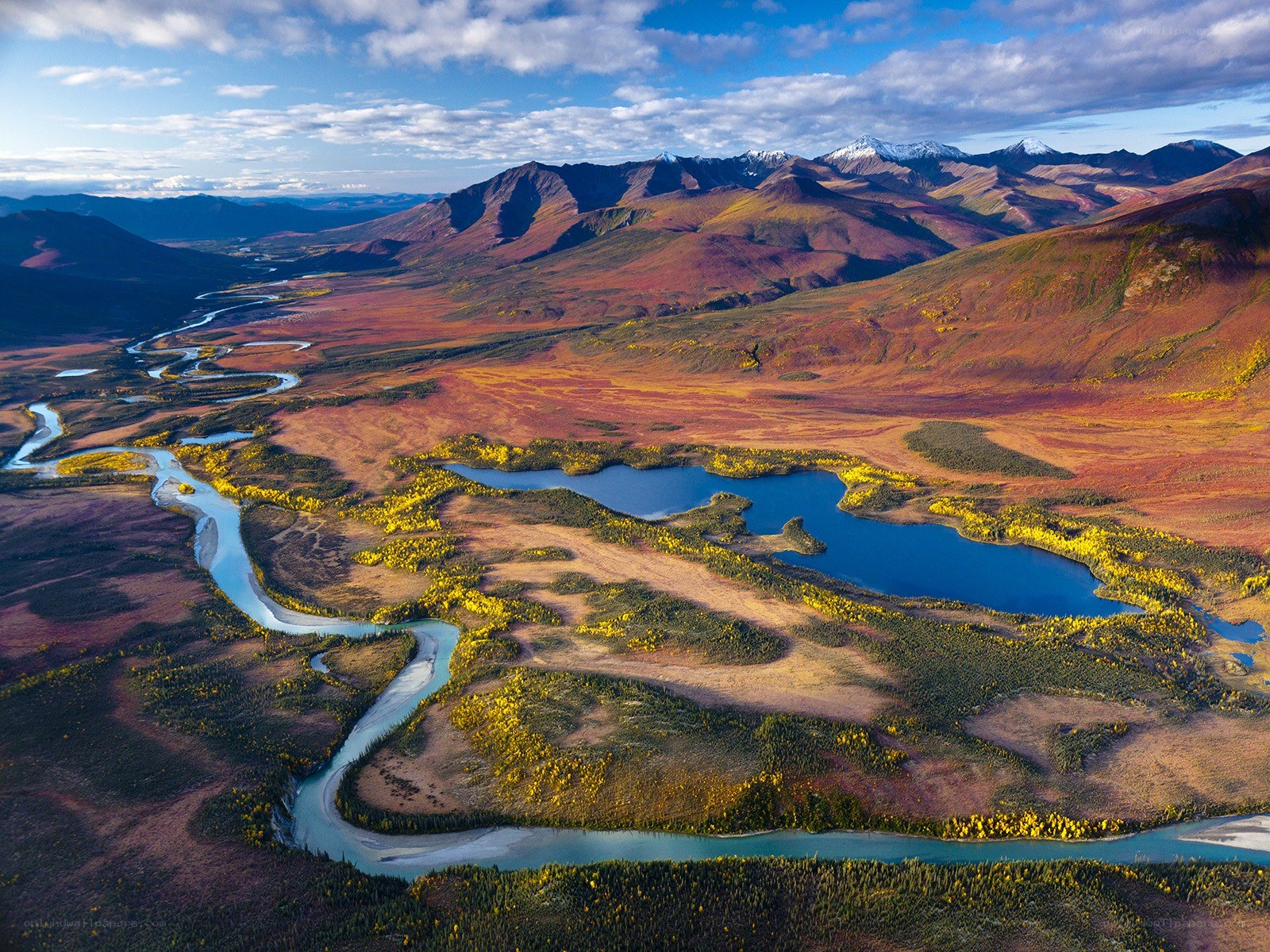 River winding through autumn mountains