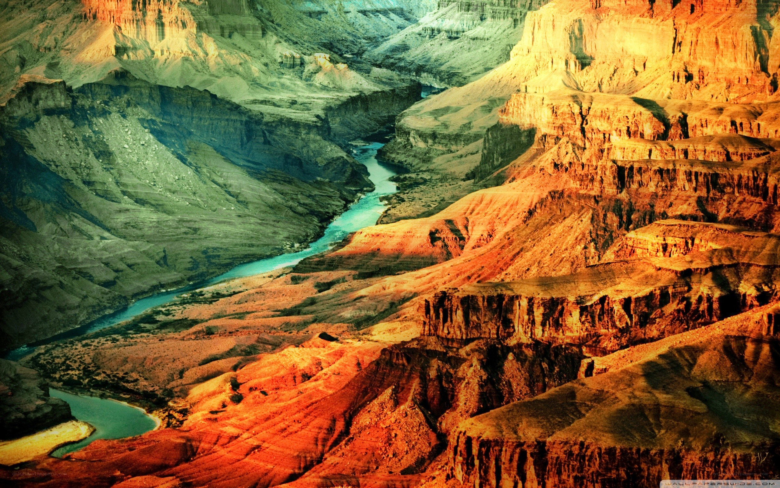 river winding through canyon