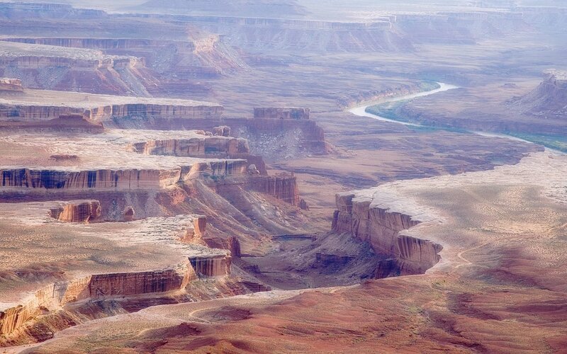 river winding through canyon