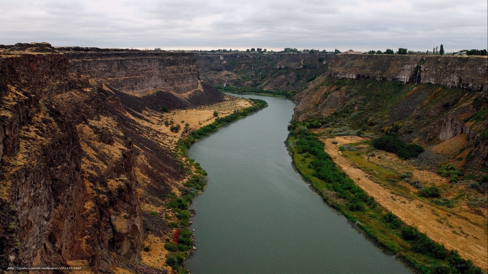 river winding through canyon