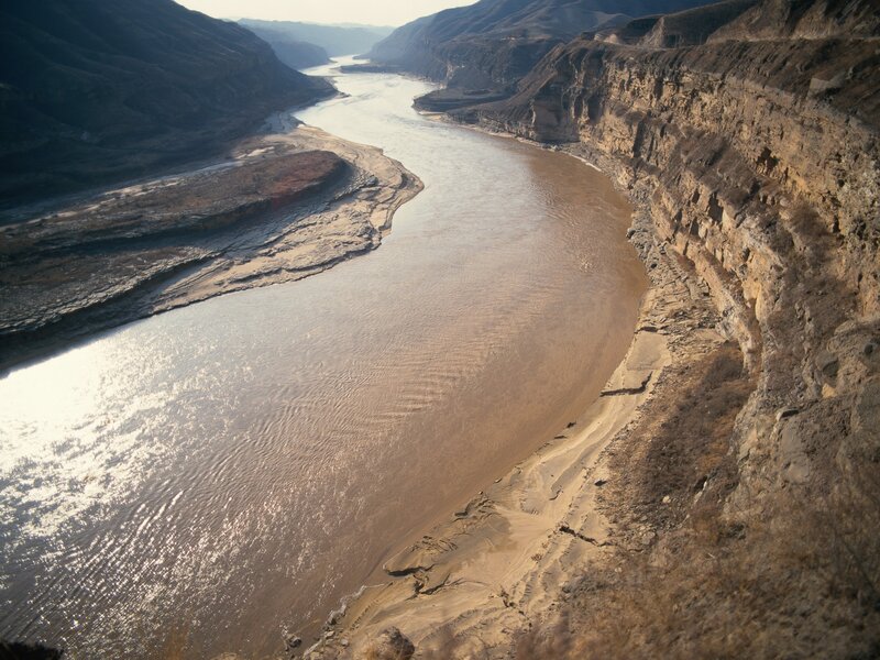 river winding through canyon