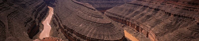 river winding through canyon