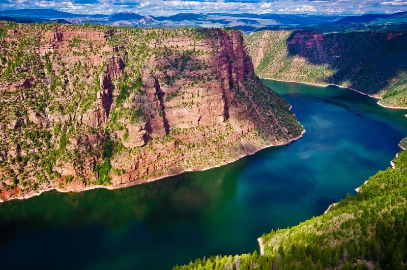 River Winding Through Canyon — Blue, Serene