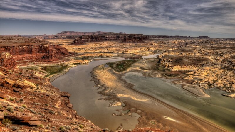 River Winding Through Canyon — Brown, Dramatic, Afternoon, Photograph, Cliffs