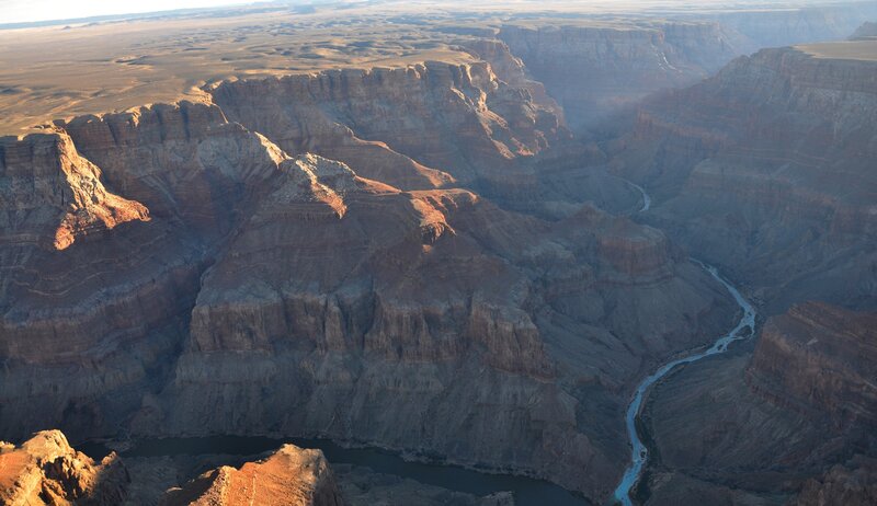 River Winding Through Canyon — Brown, Dramatic, Sunset