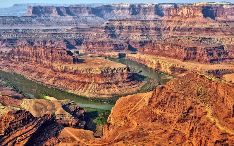 River Winding Through Canyon — Red, Dramatic, Afternoon