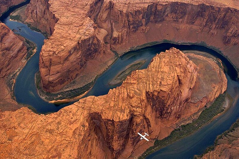 River Winding Through Canyon — Red