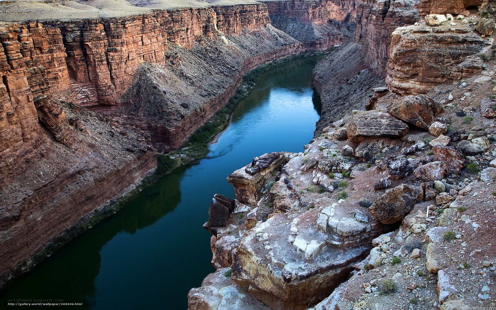 river winding through canyon