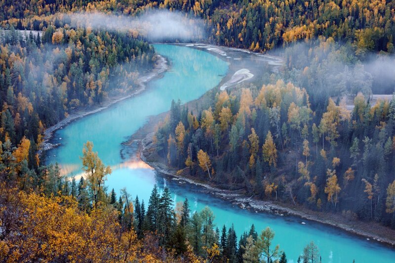 River Winding Through Forest — Blue, Serene, Autumn, Photograph