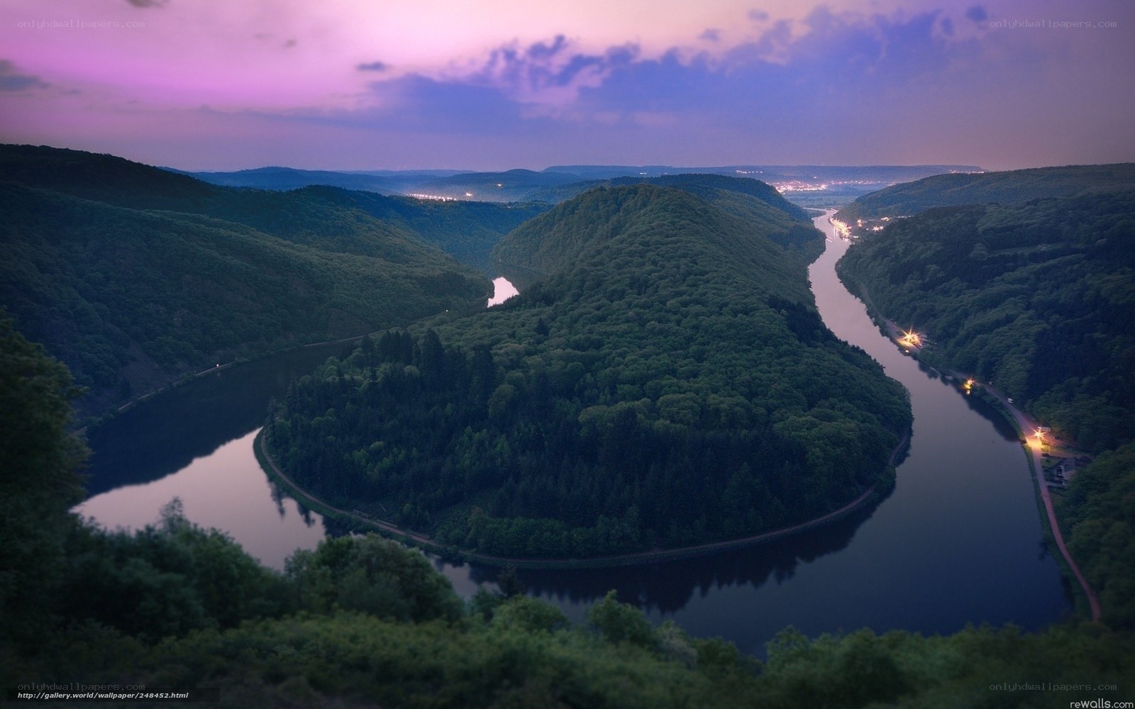 river winding through forested hills
