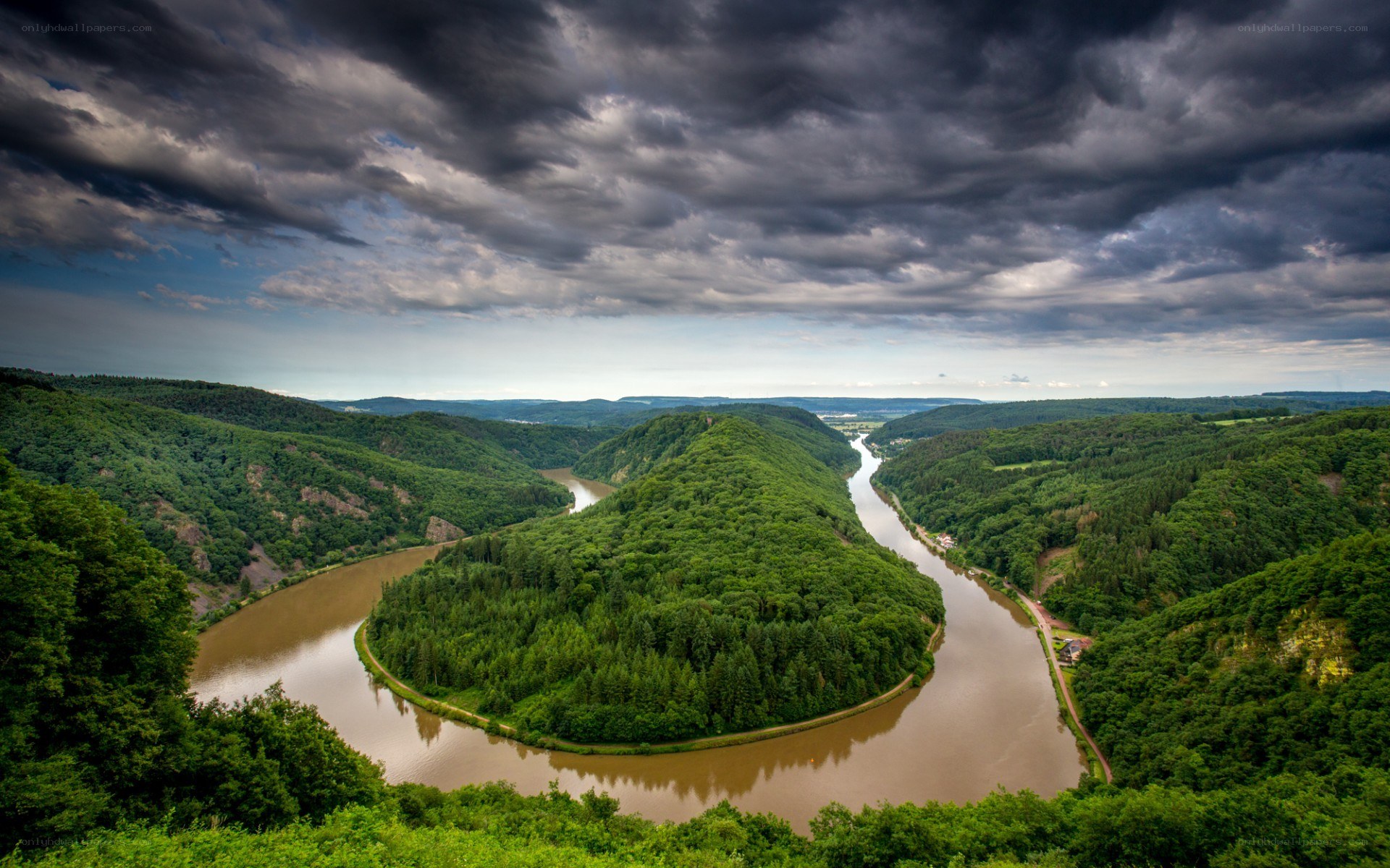 river winding through forested valley