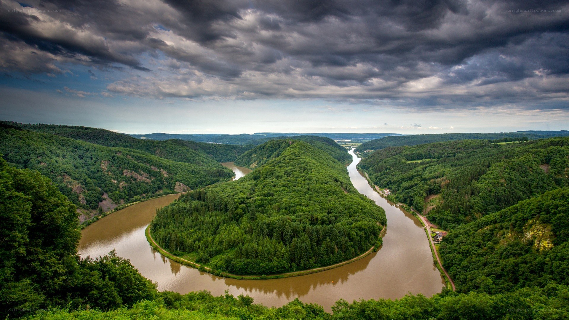 river winding through forested valley